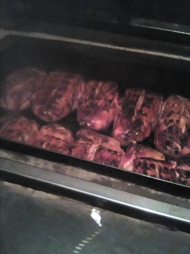 Shoulders Cooking in the Pit